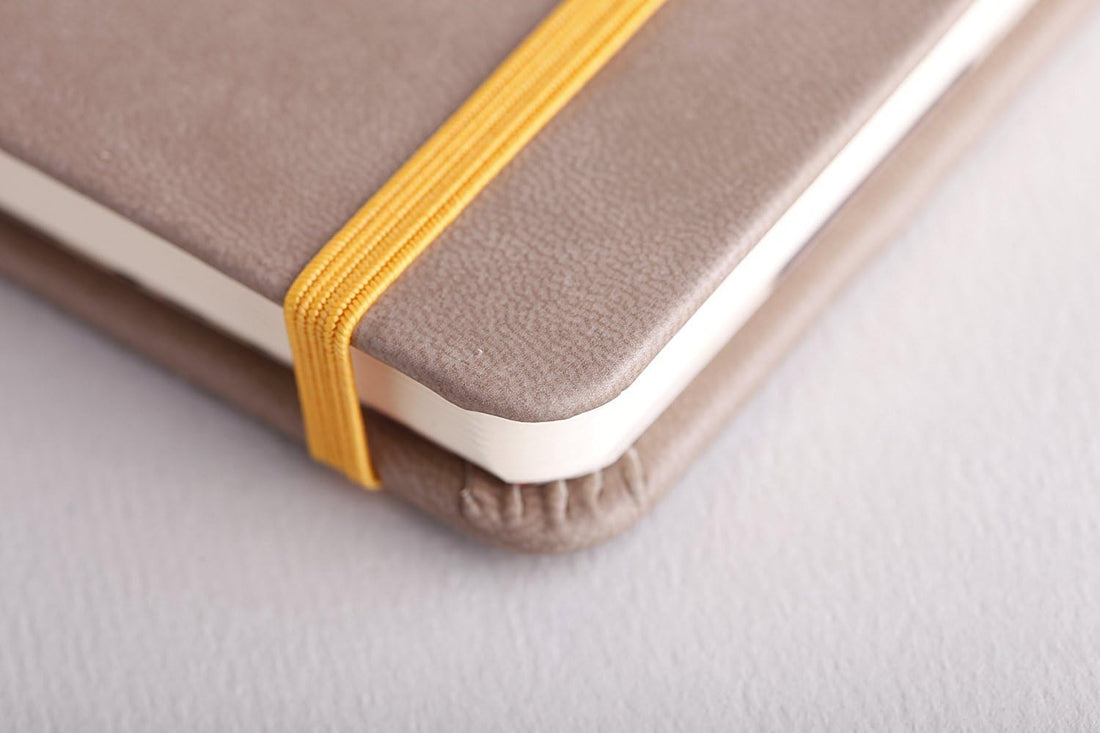 Carnet rembordé rigide ligné -taupe- A5. 192 pages (14.8x21cm) RHODIA