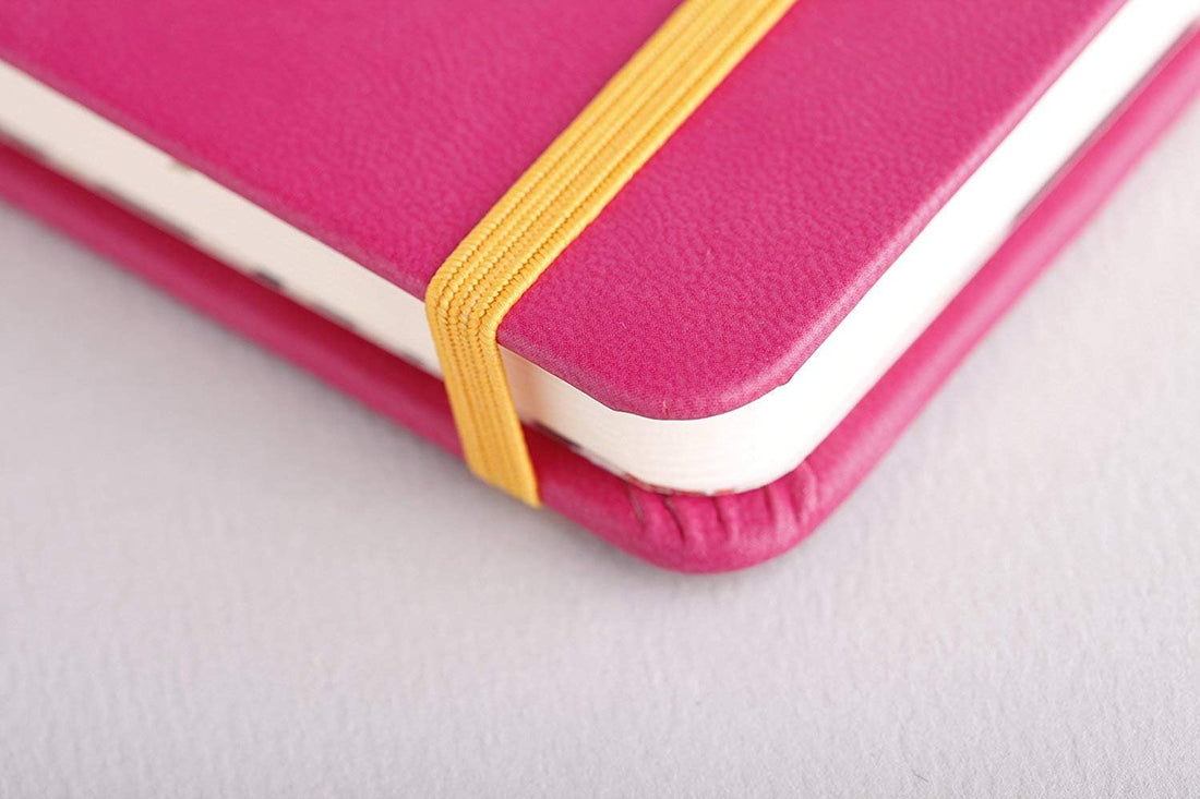 Carnet rembordé rigide ligné -framboise- A5. 192 pages (14.8x21cm) RHODIA