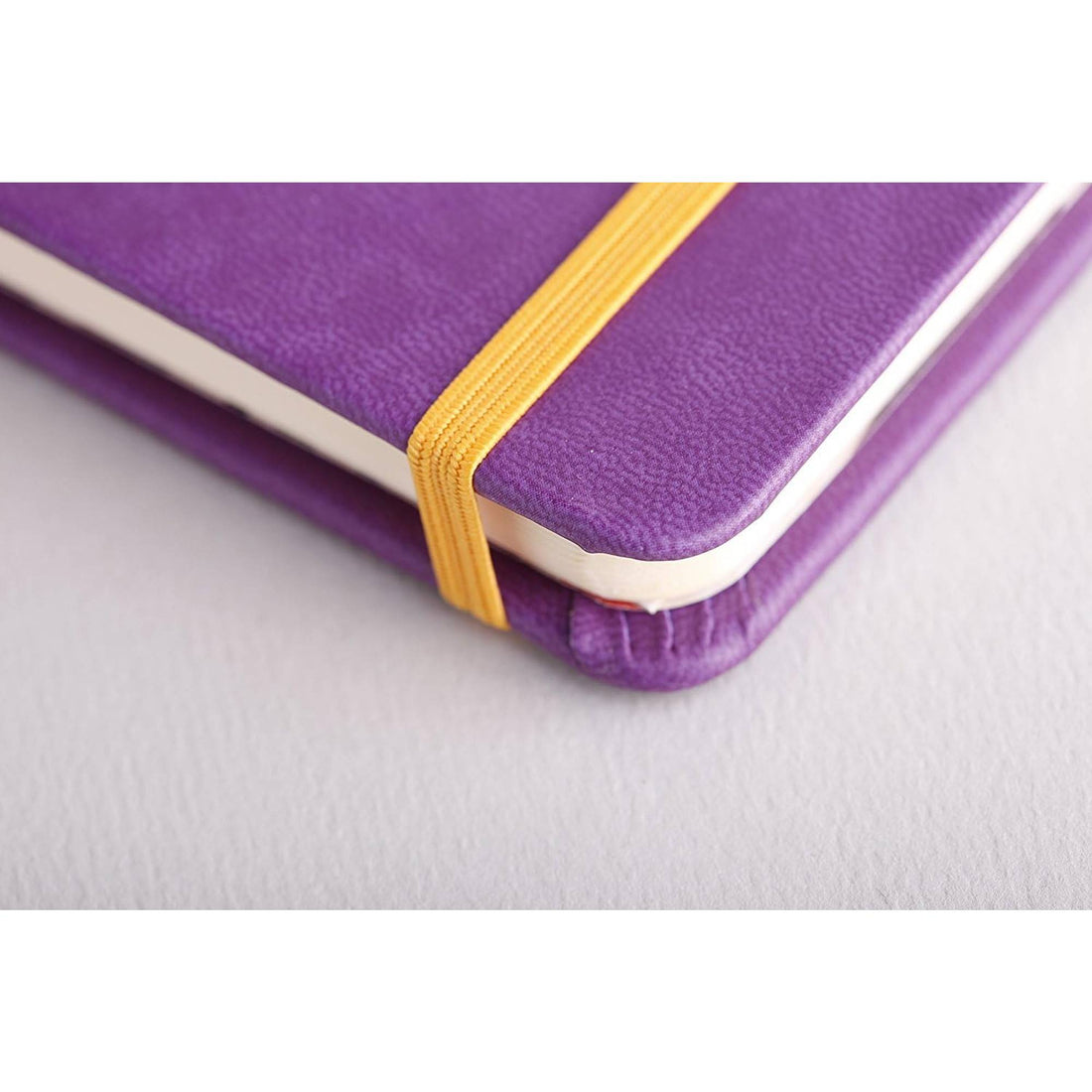 Carnet rembordé rigide ligné -violet- A5. 192 pages (14.8x21cm) RHODIA